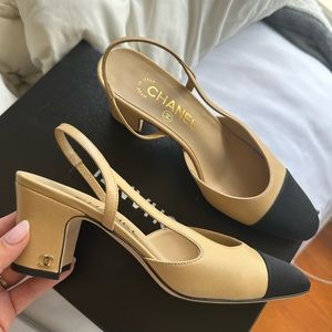 Chanel Nude and black slingback
